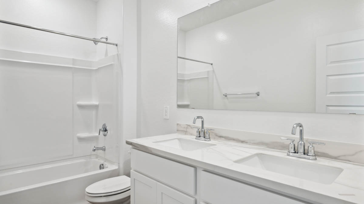 Upstairs bathroom into between bedrooms.