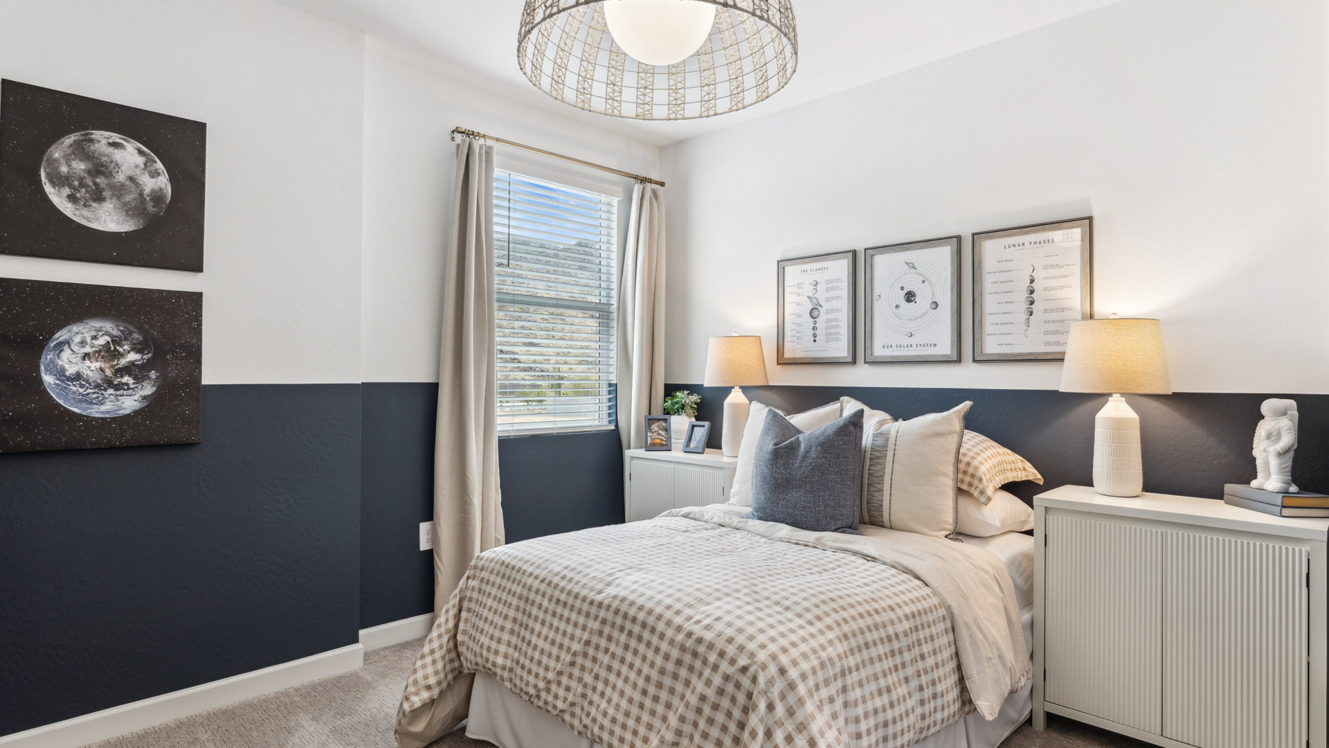 Comfortable guest bedroom featuring neutral-toned walls and a large closet.