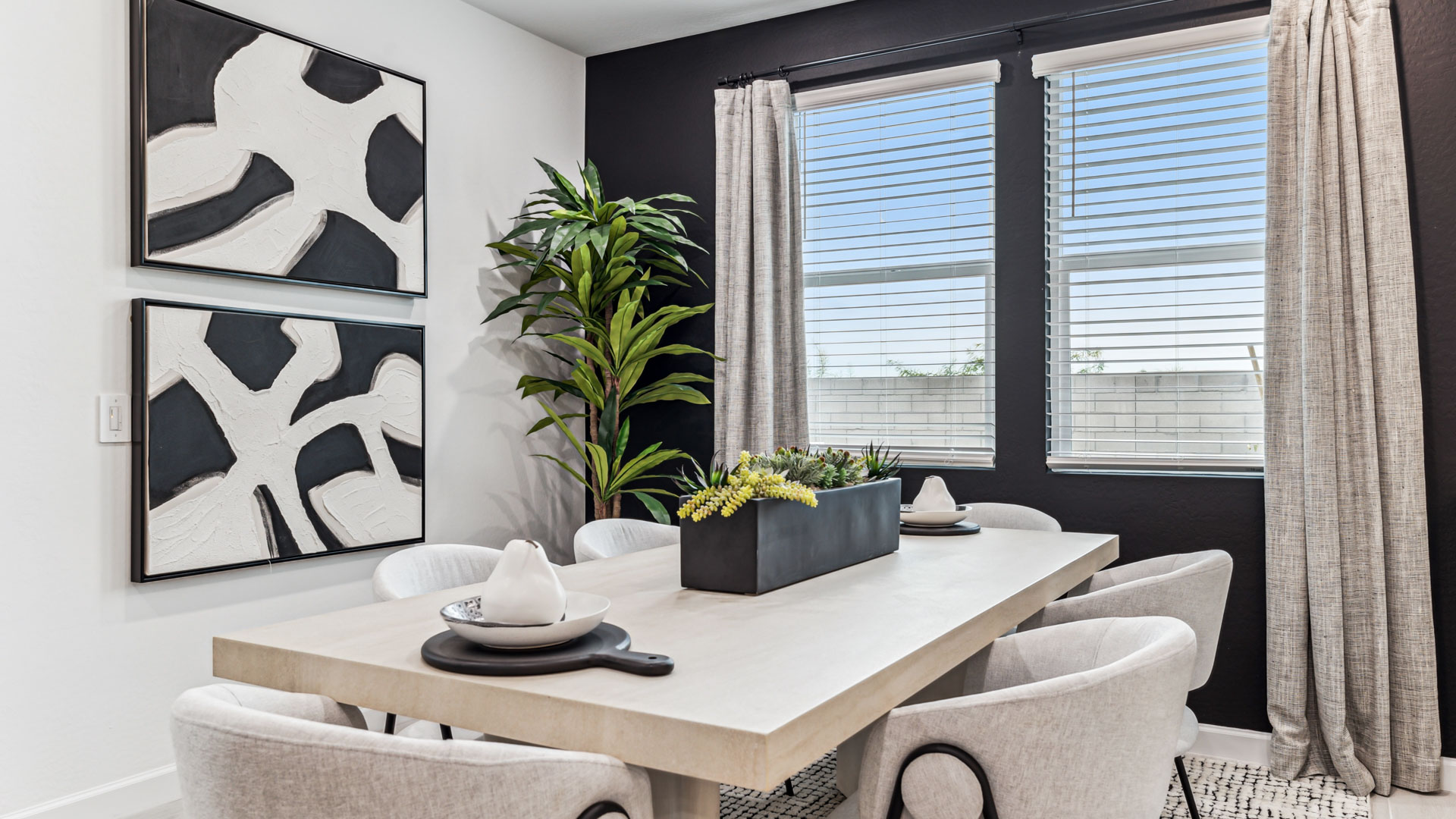 Dining room with natural light, open access and seamless flow continuing to front foyer access