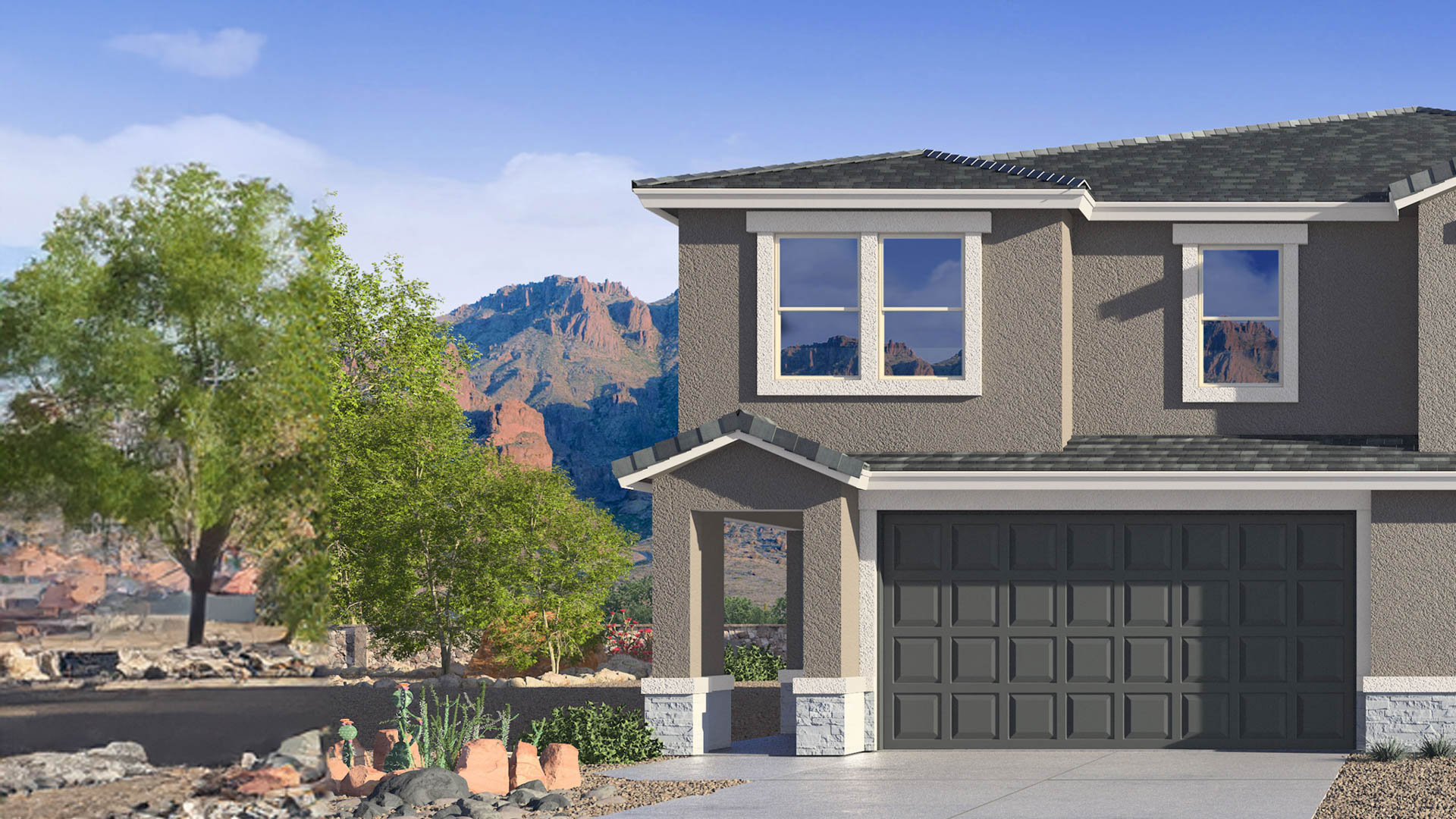 Newly built two-story townhome with modern architecture, a double garage, and landscaped front yard.