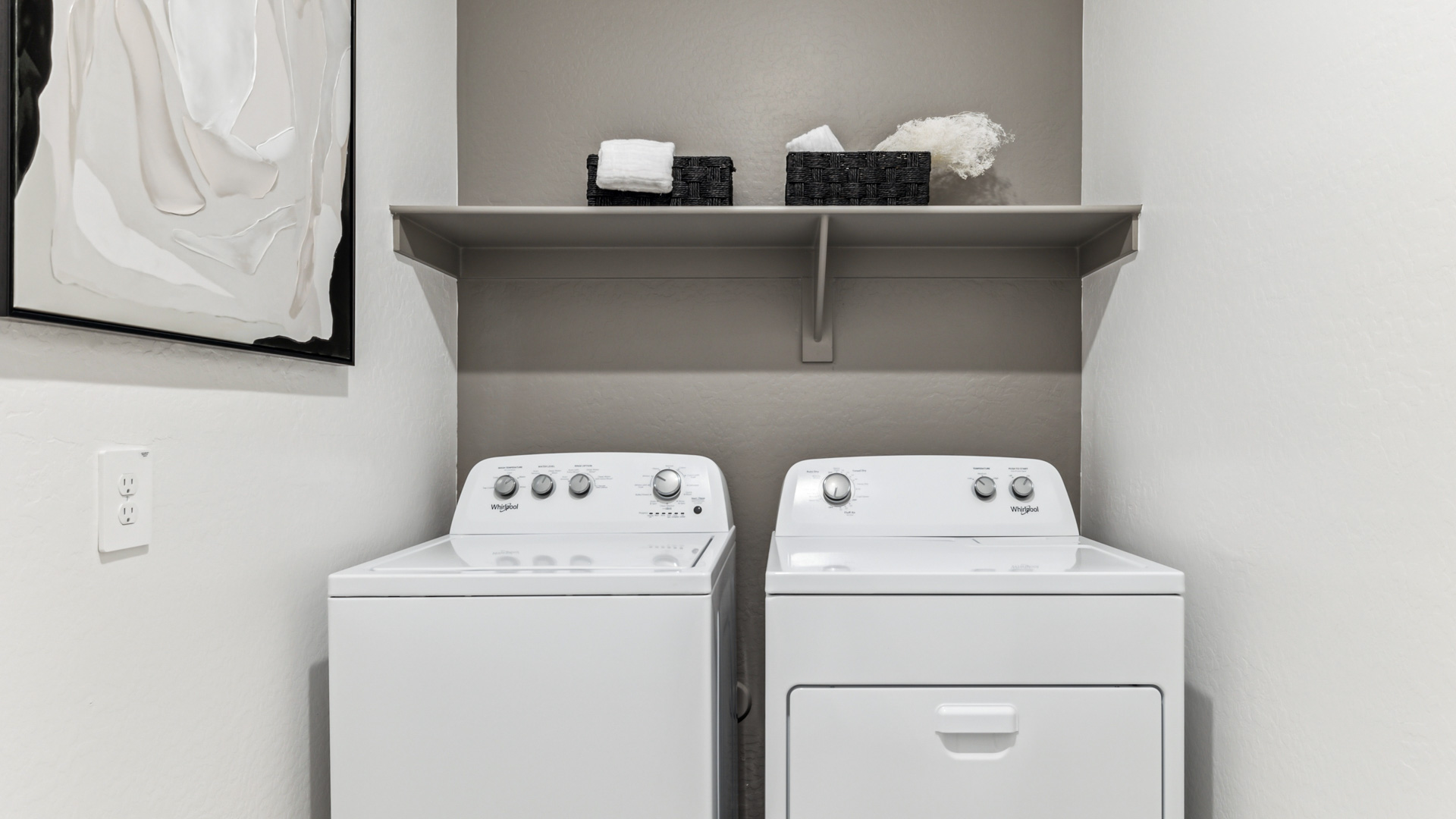 laundry room with shelving