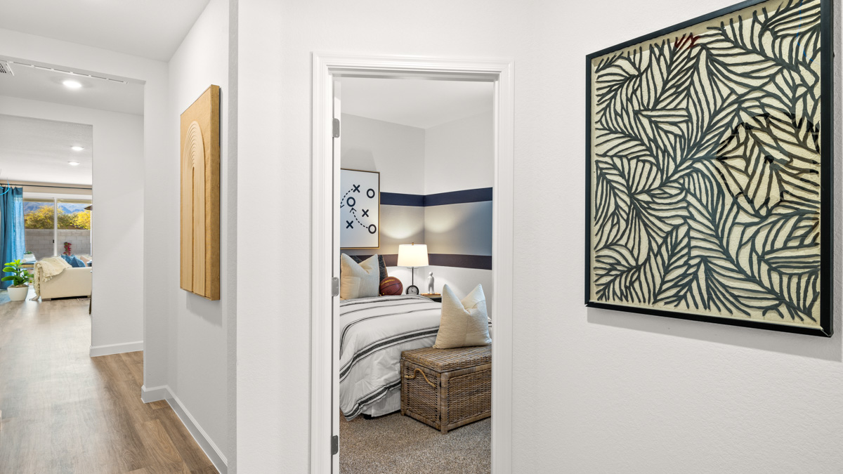 Entry hallway leading to bedrooms in the background.