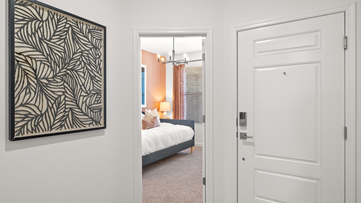 Entry hallway leading to bedrooms in the background.