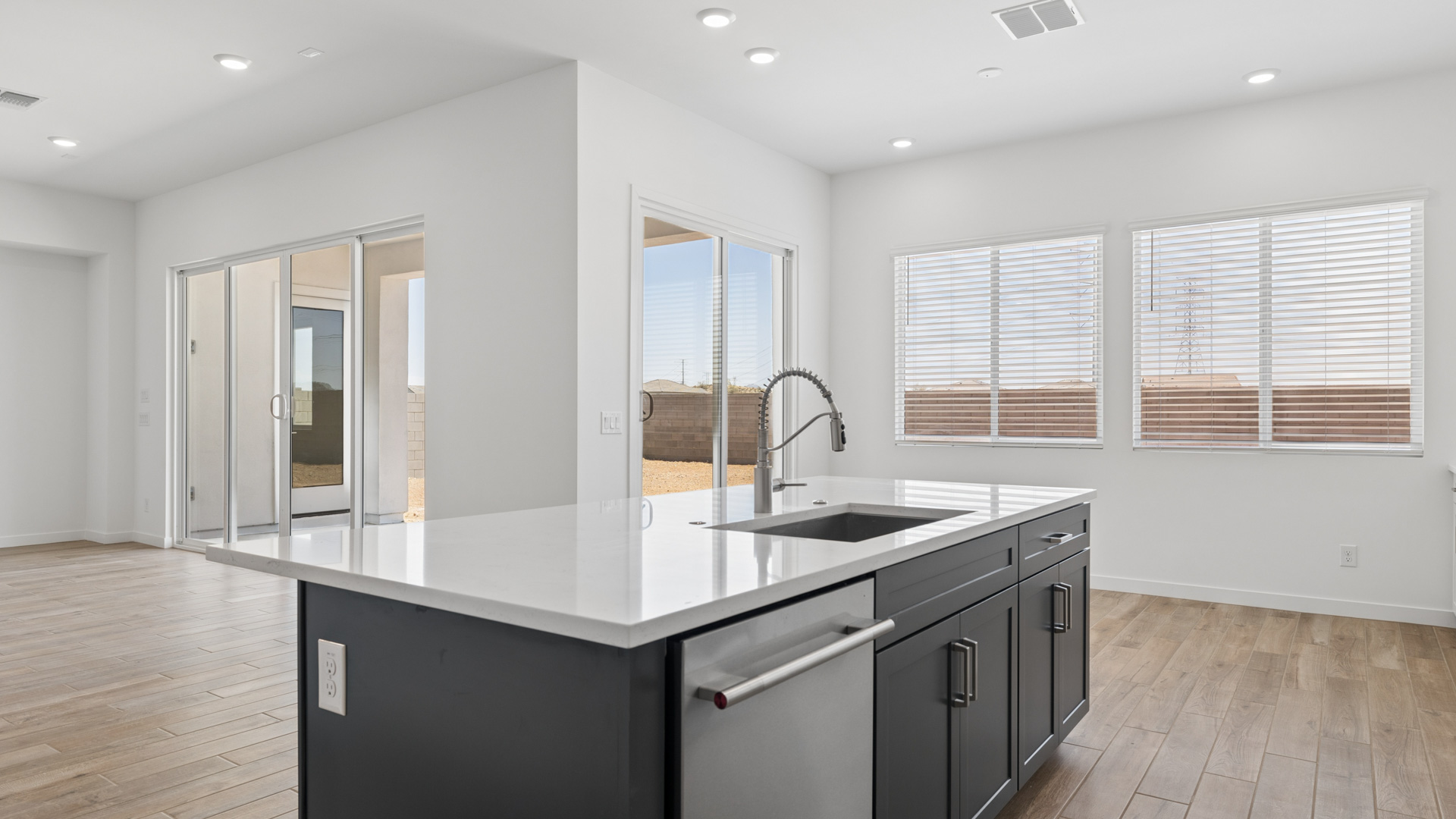 spacious kitchen with large island, walk in closet and floor to ceiling cabinets