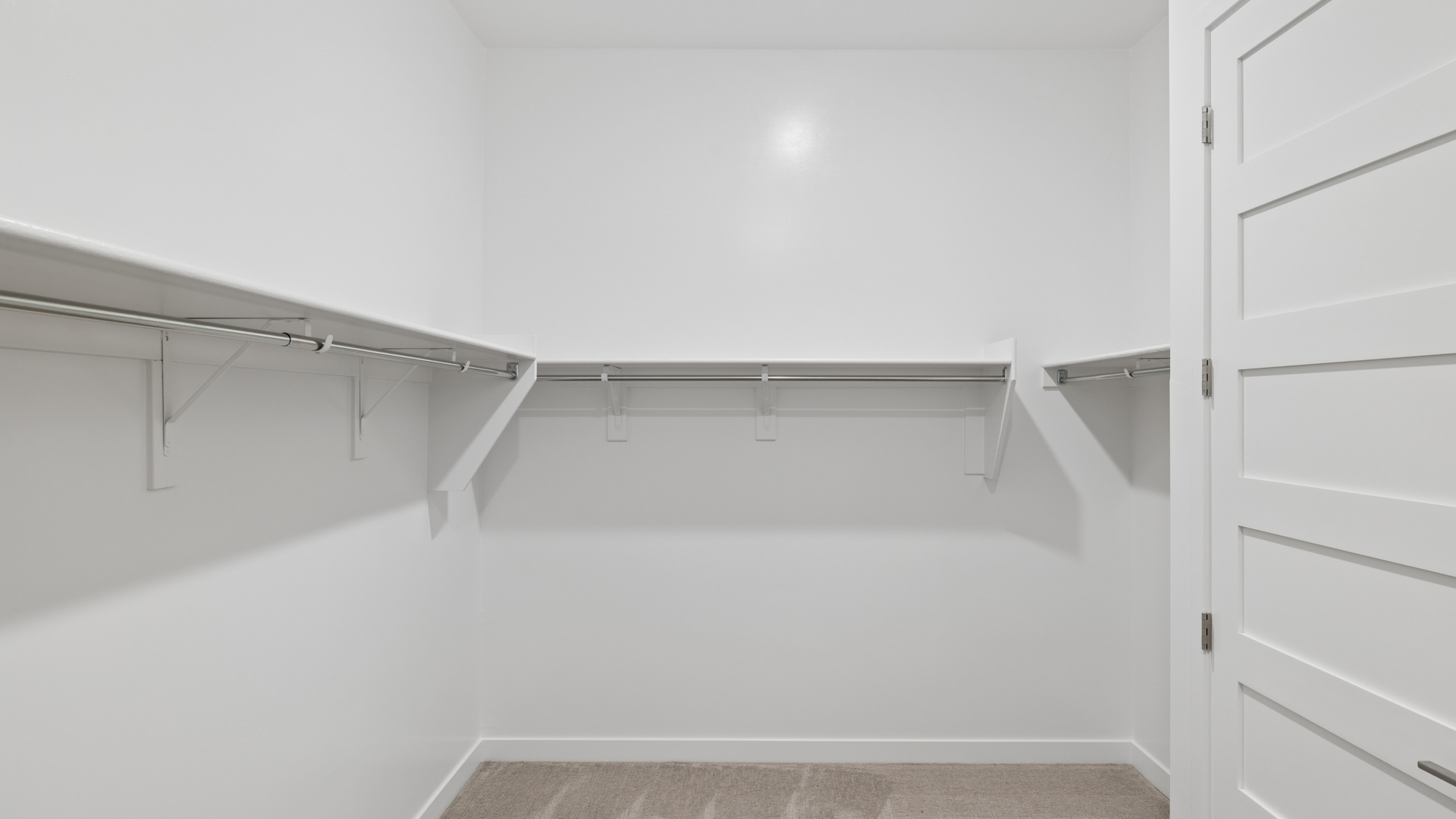 primary suite with walk in closet