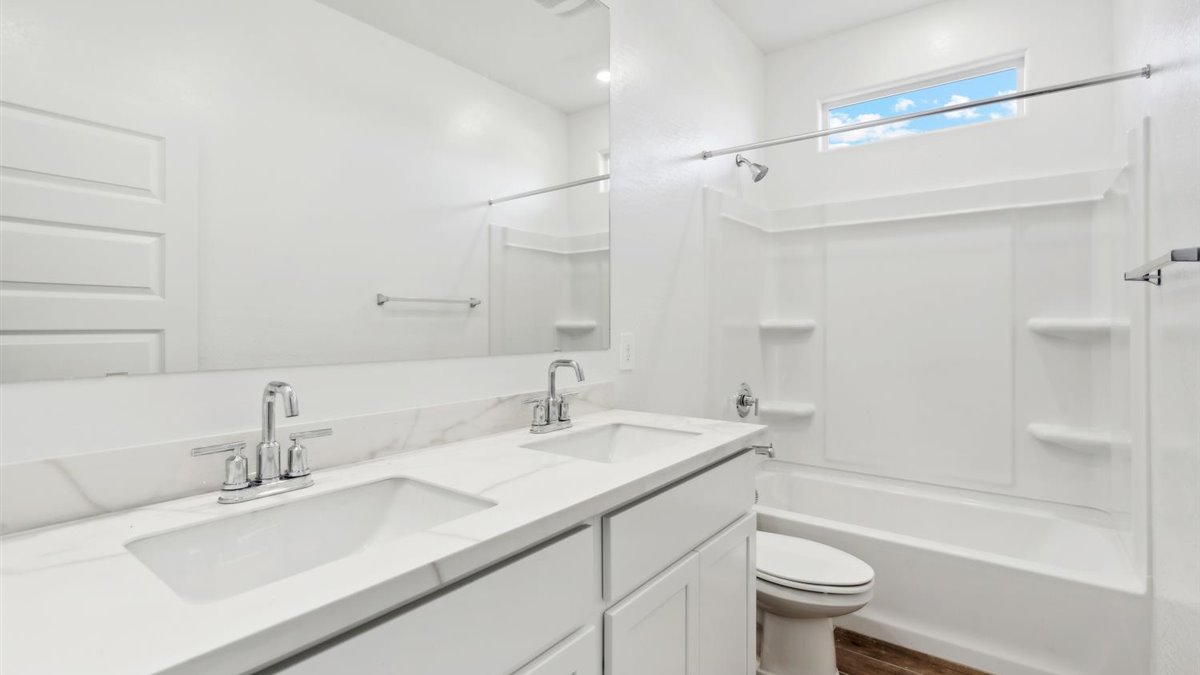 Interior bathroom with sink and full-sized shower