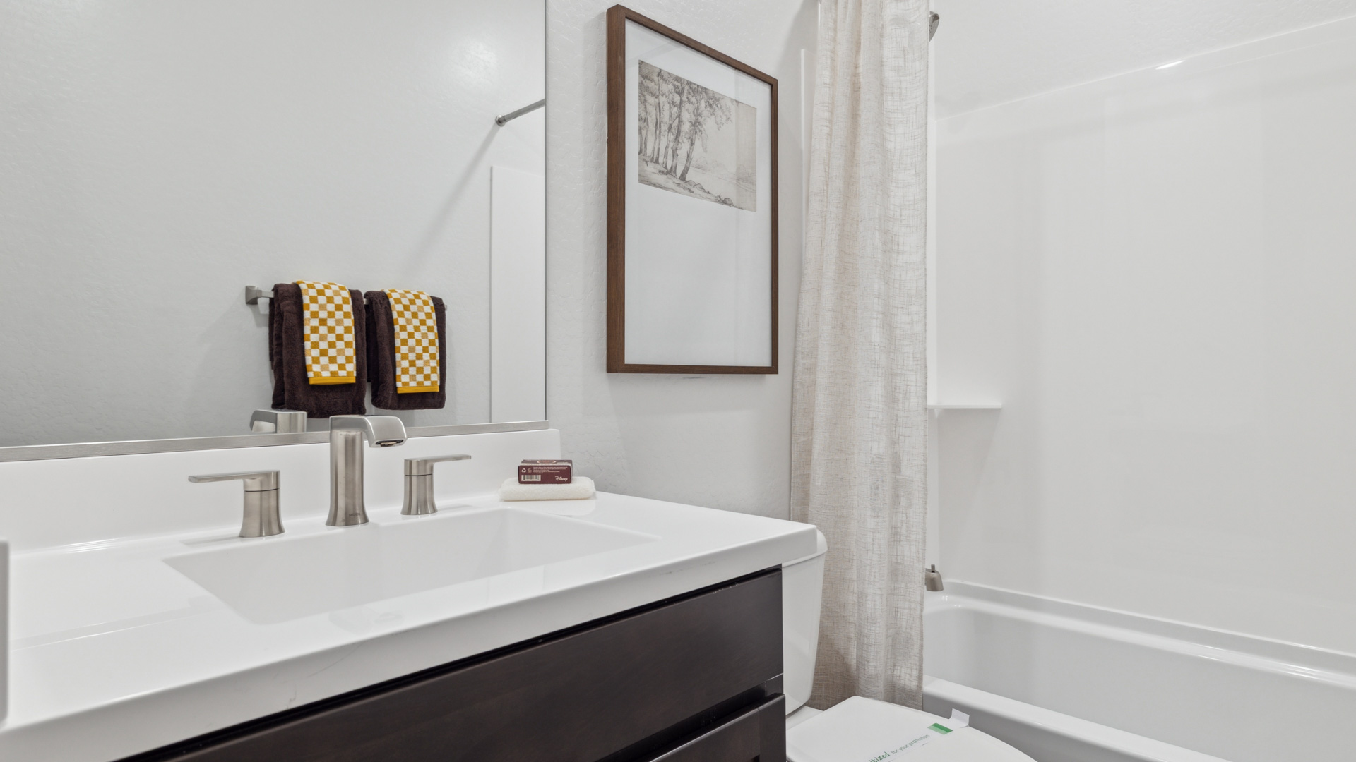 guest bathroom with bathtub