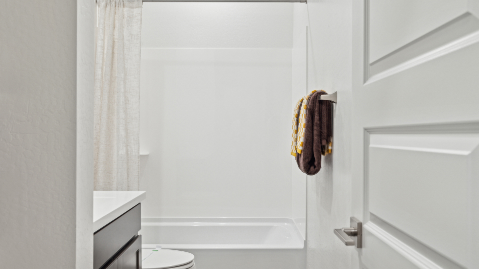 guest bathroom with bathtub