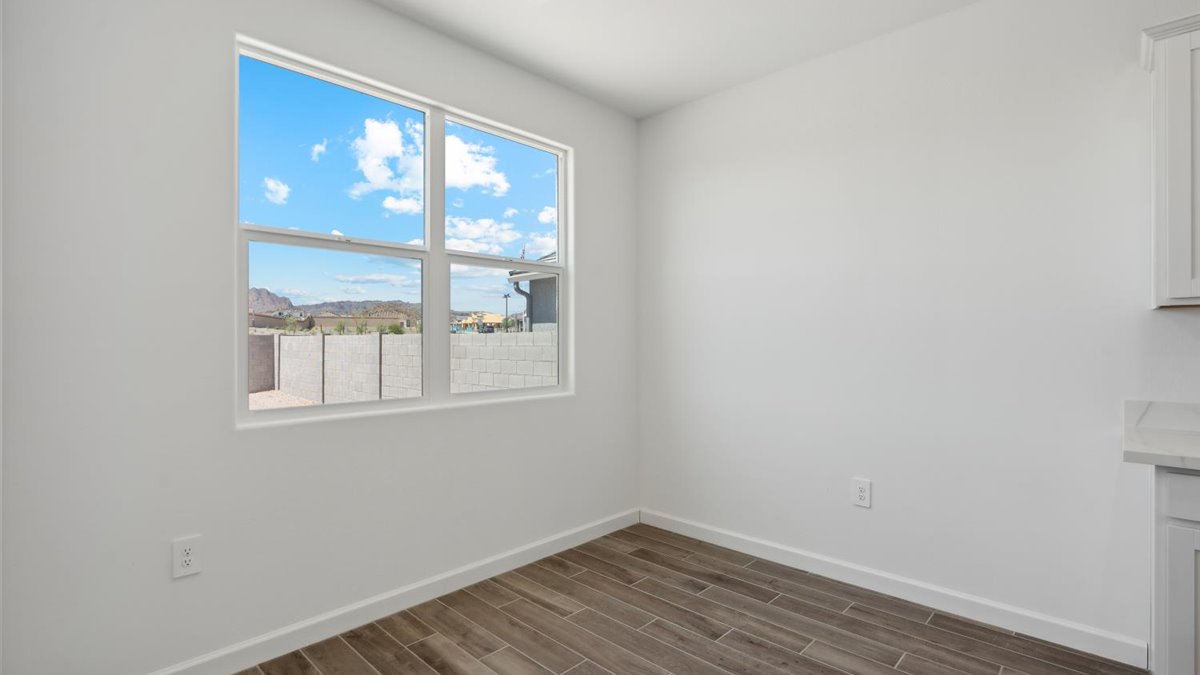 Dining room with natural light, open access and seamless flow continuing to front foyer access