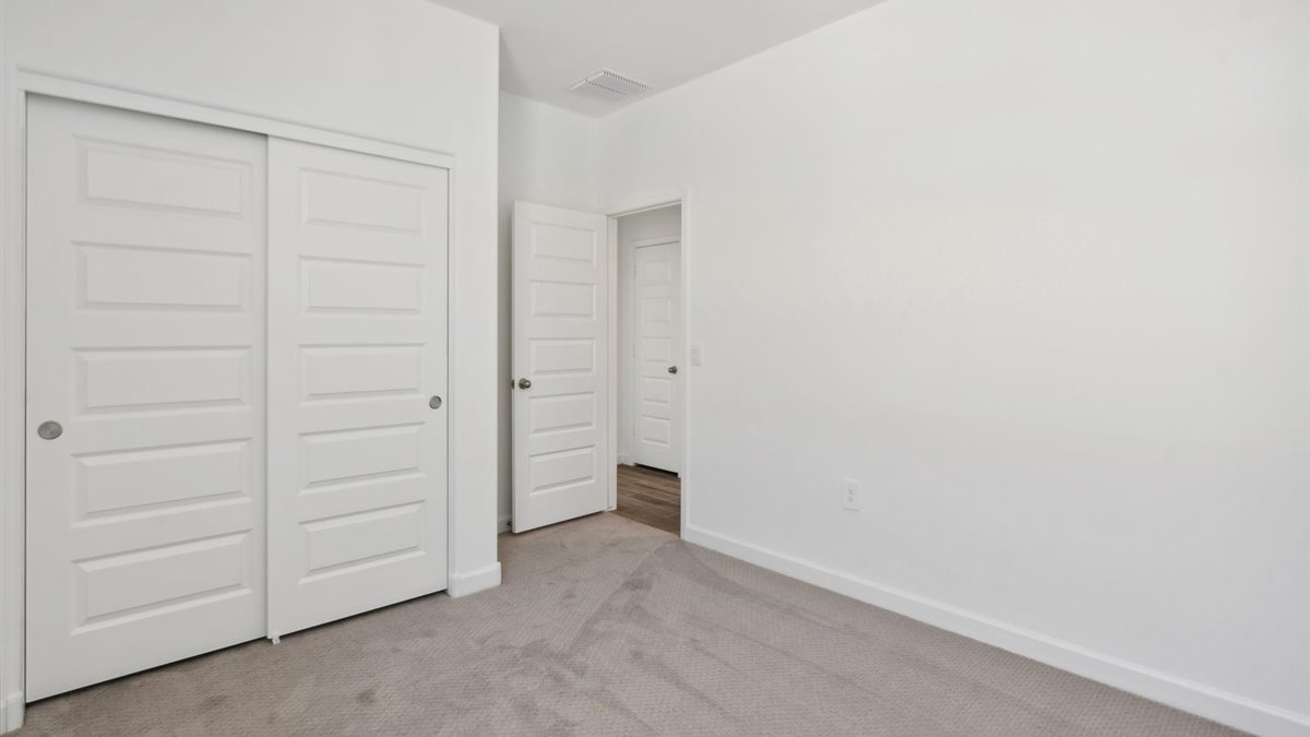 Bedroom 3, multi-use bedroom, study, flex-office, craft, entertainment, game room in D.R. Horton's new home