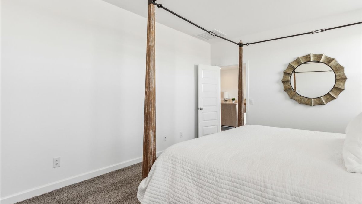 primary suite with walk in closet