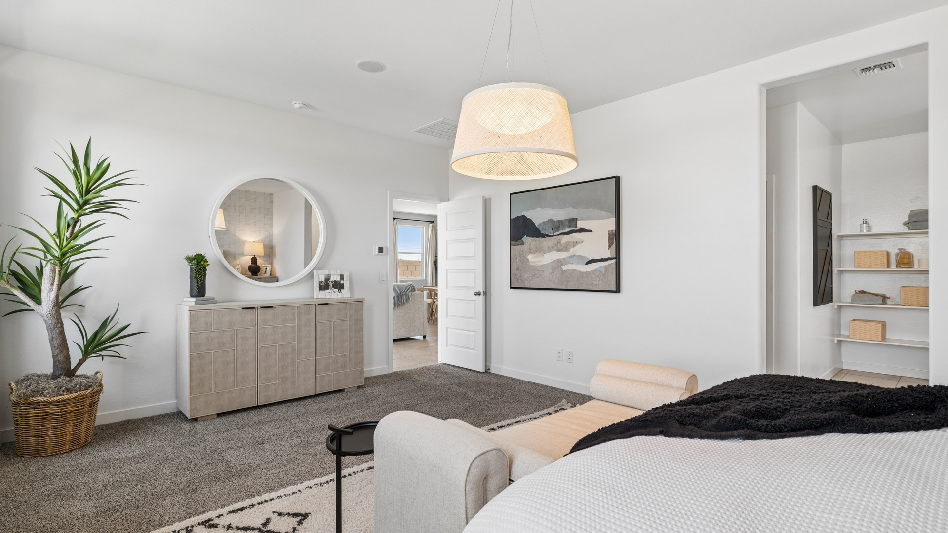 primary suite with walk in closet