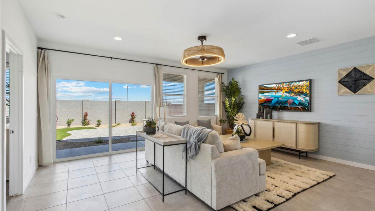 Kingston great room with sliding glass door to the backyard