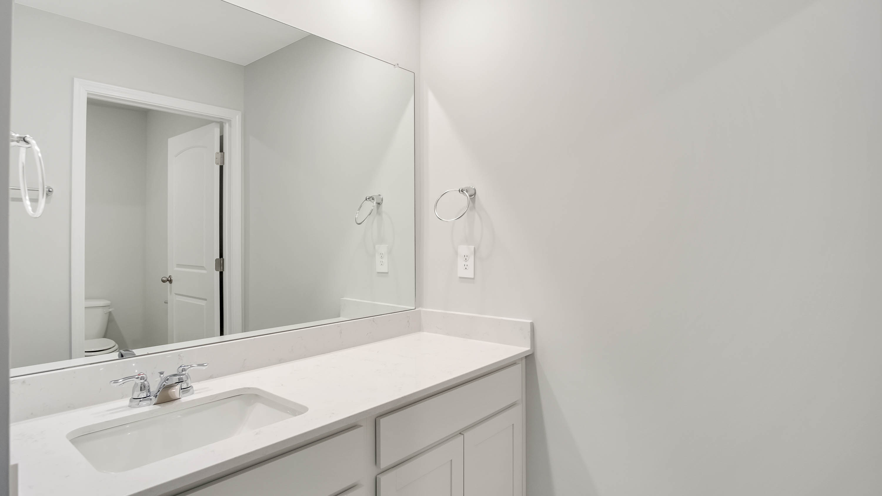 Bathroom with quartz countertops in new home