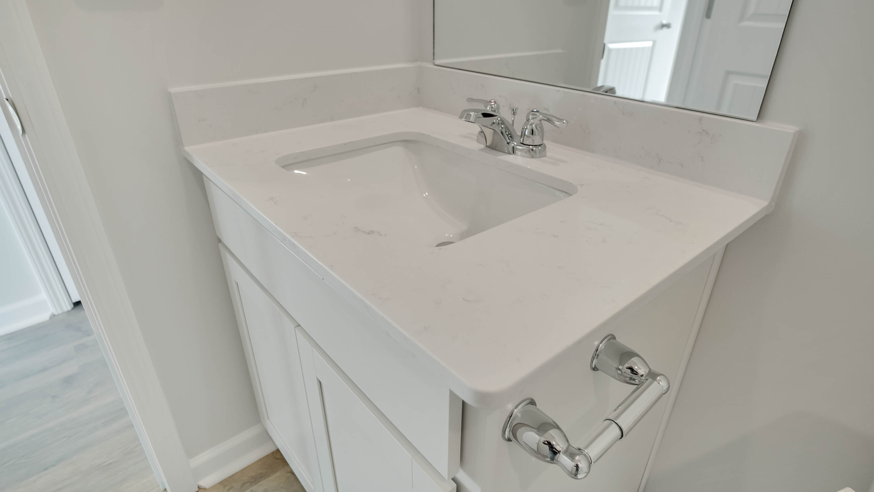 Bathroom with quartz countertops in new home
