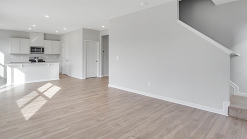 Modern kitchen with quartz countertops and stainless steel appliances