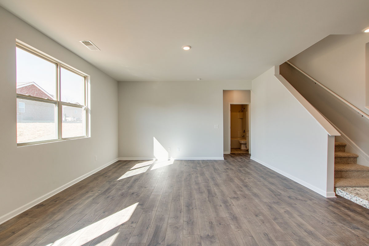 Living area in modern, open concept new construction home
