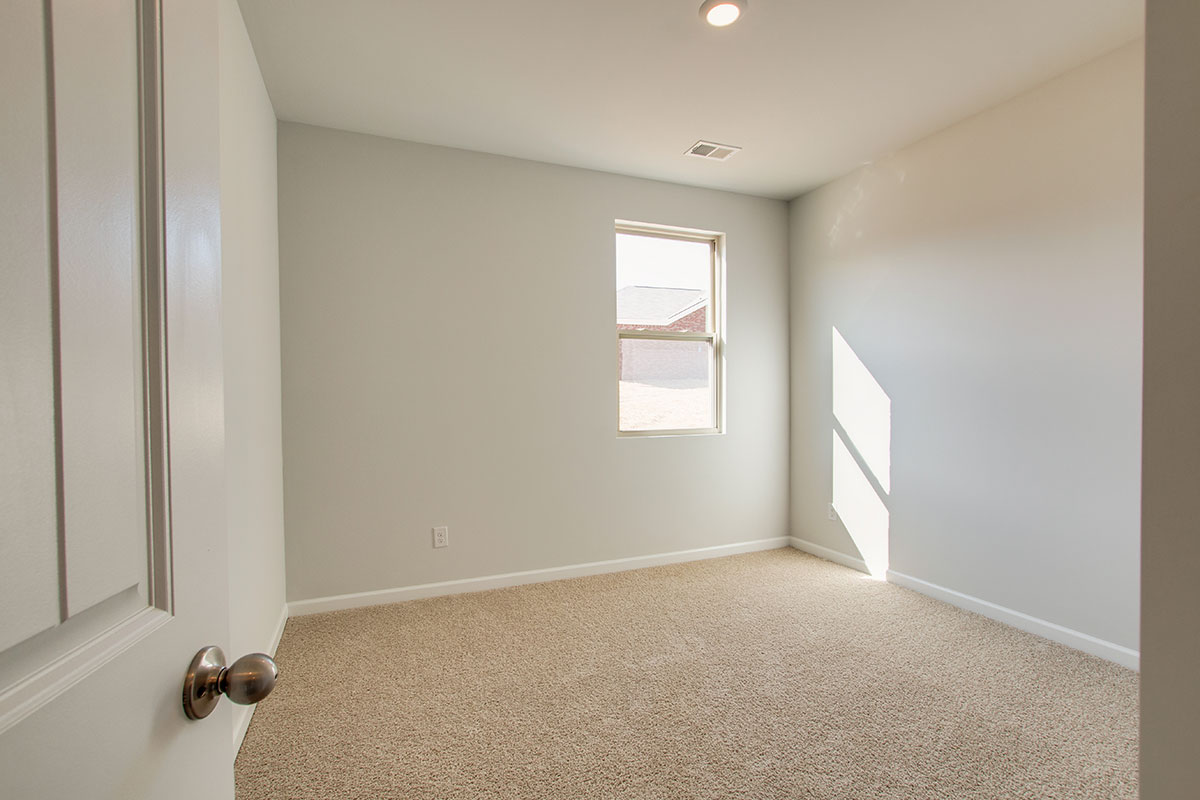 Bedroom in modern, two-story new home