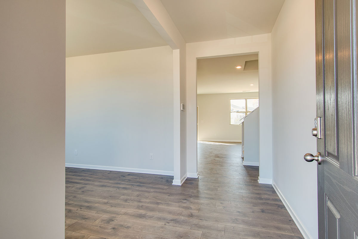 Entry hallway in modern, open concept floorplan