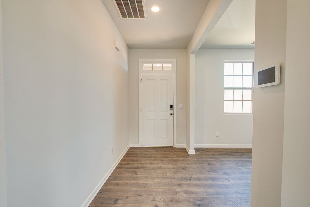 Entry hallway in modern, open concept floorplan