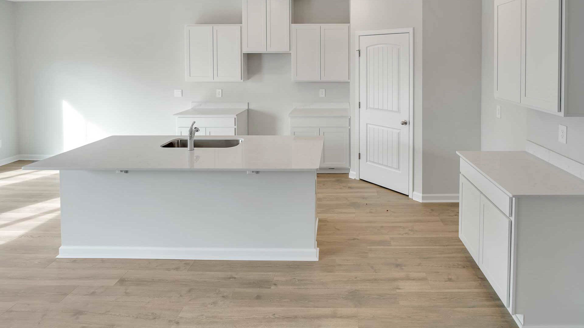 Kitchen with quartz countertops and with stainless steel appliances