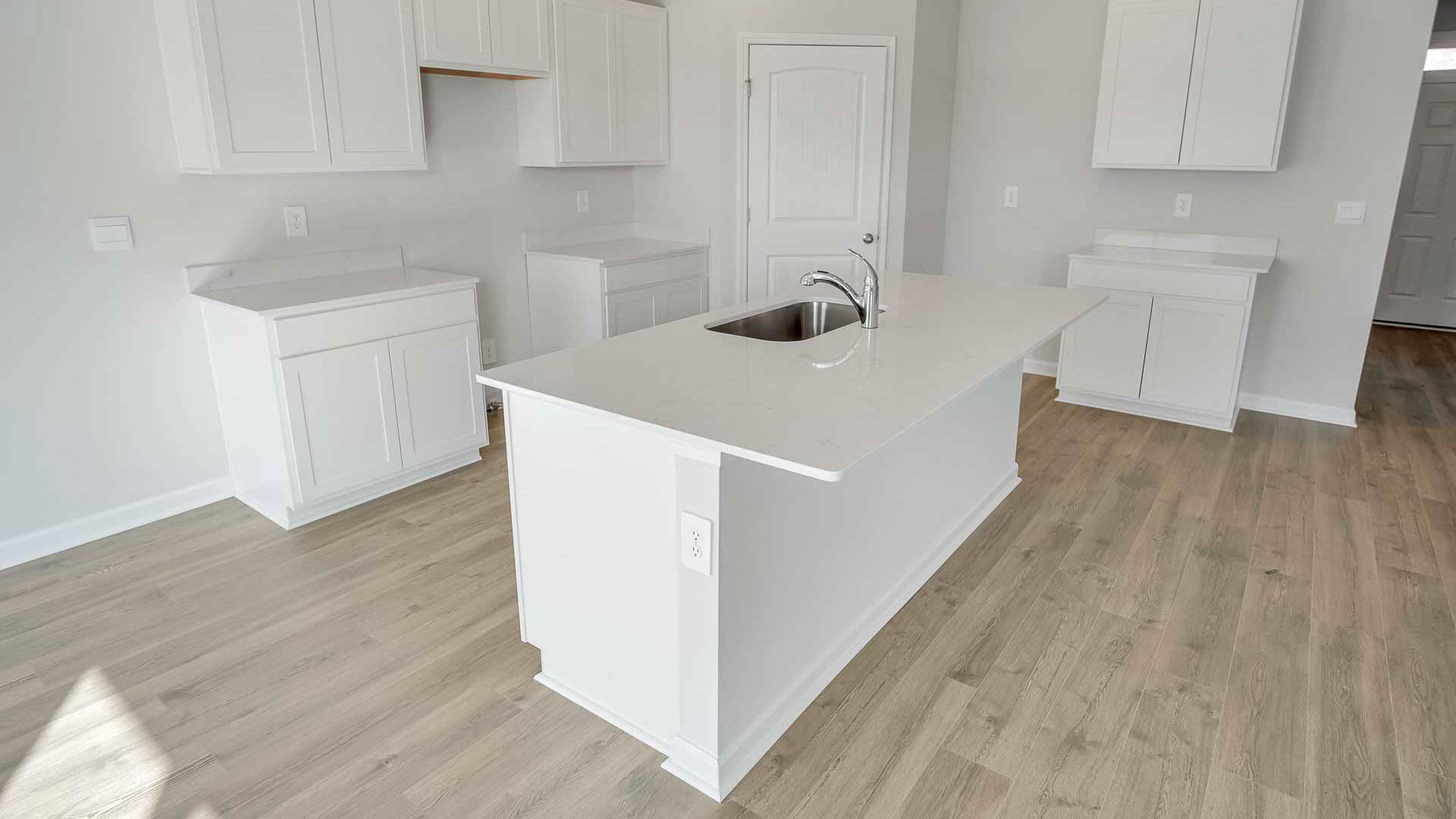 Kitchen with quartz countertops and with stainless steel appliances