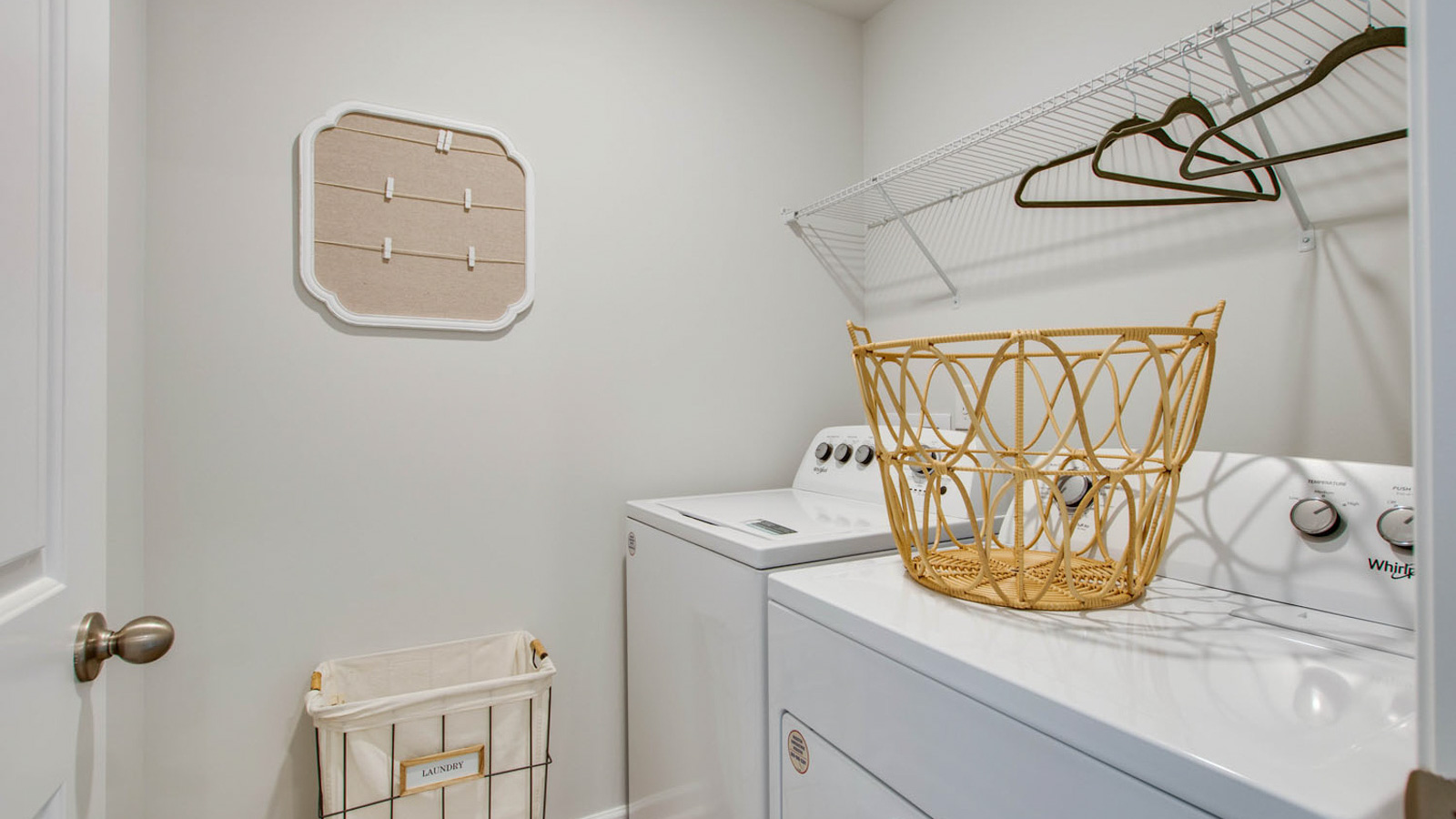 River Landing utility laundry smartly designed with overhead organized storage, a drop zone, with new washer, dryer included