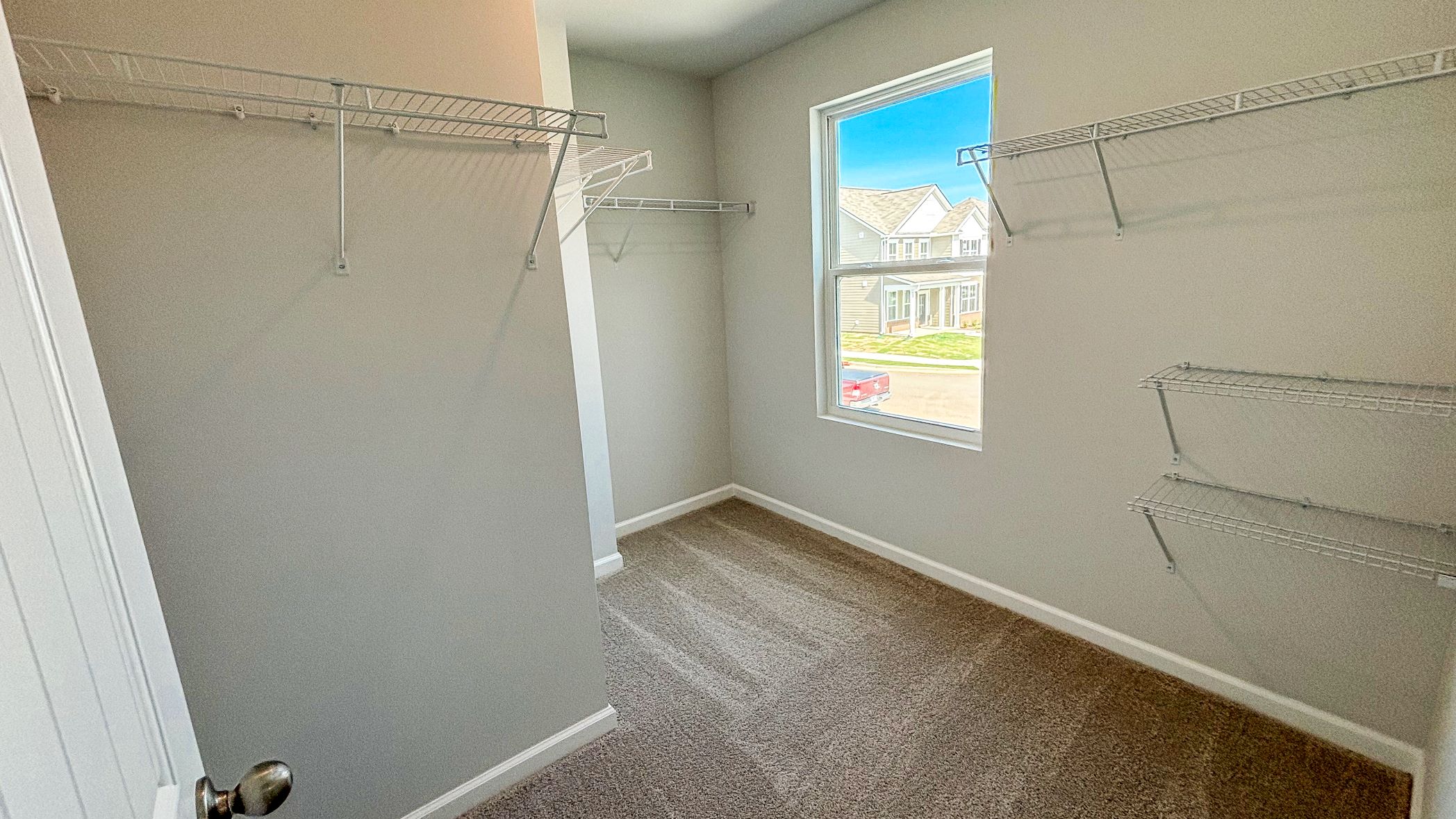 River Landing utility laundry smartly designed with overhead organized storage, a drop zone, with new washer, dryer included