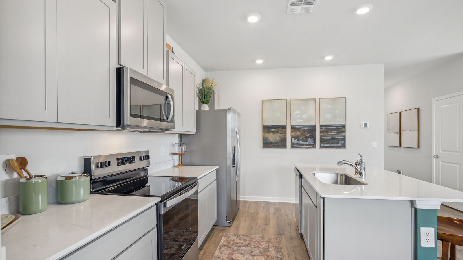 Interior of two story new furnished townhome with a modern design and open-concept floorplan