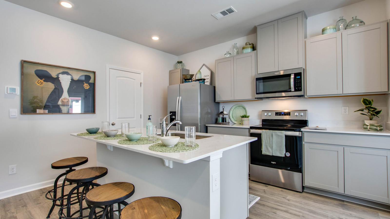 New appliances included in our larger kitchen island area with seating anchor the kitchen, near dining, great rooms