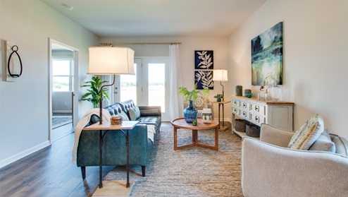 Living room with access to back yard.