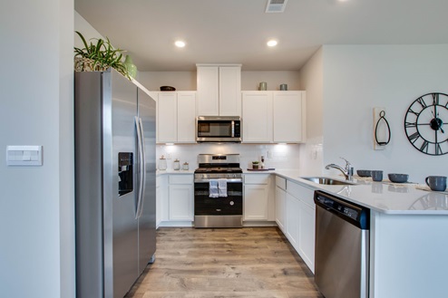 Kitchen with stainless steel appliances.