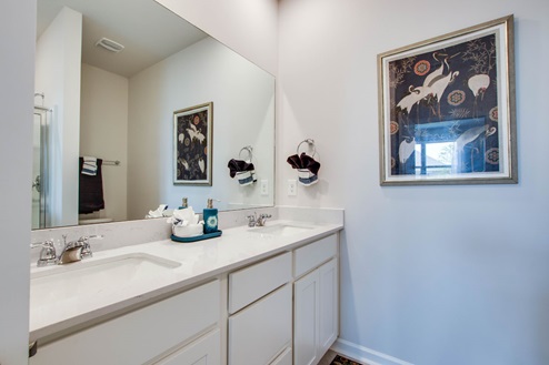 Bathroom with double vanity sink.