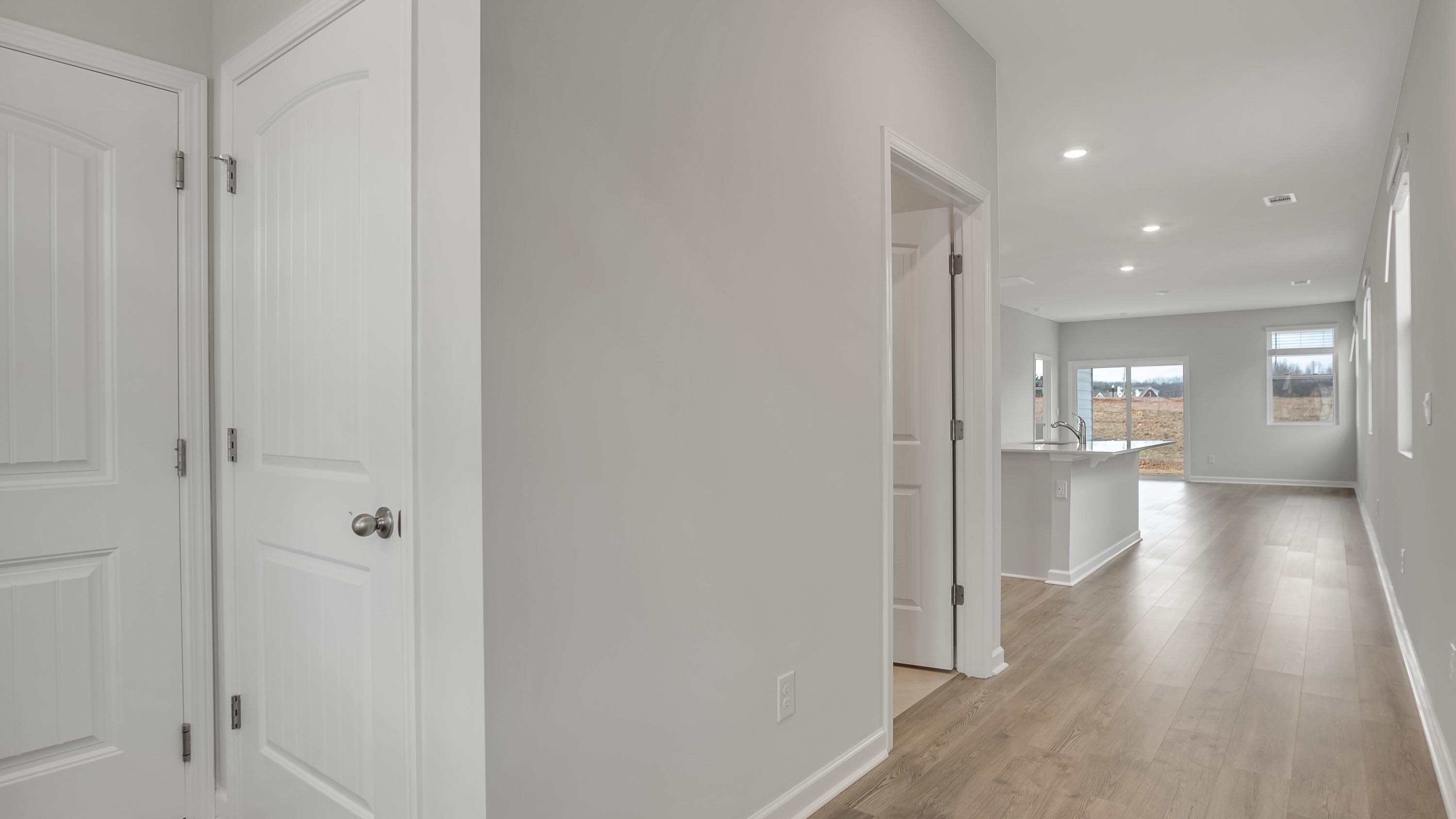 Entry hallway to modern, one-story home