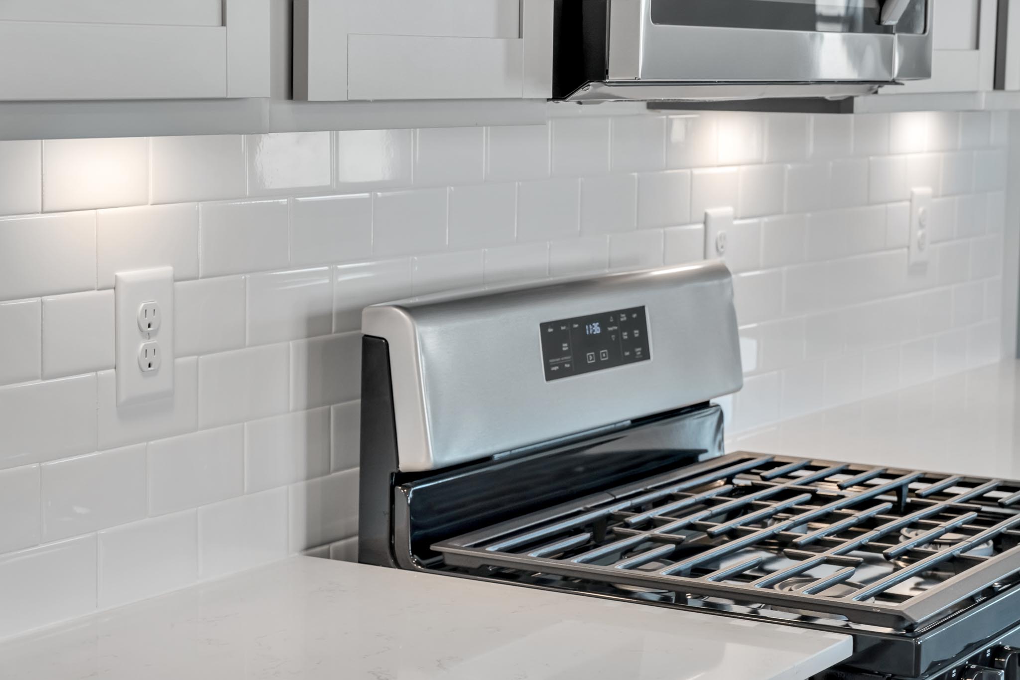 Kitchen with gas stove.