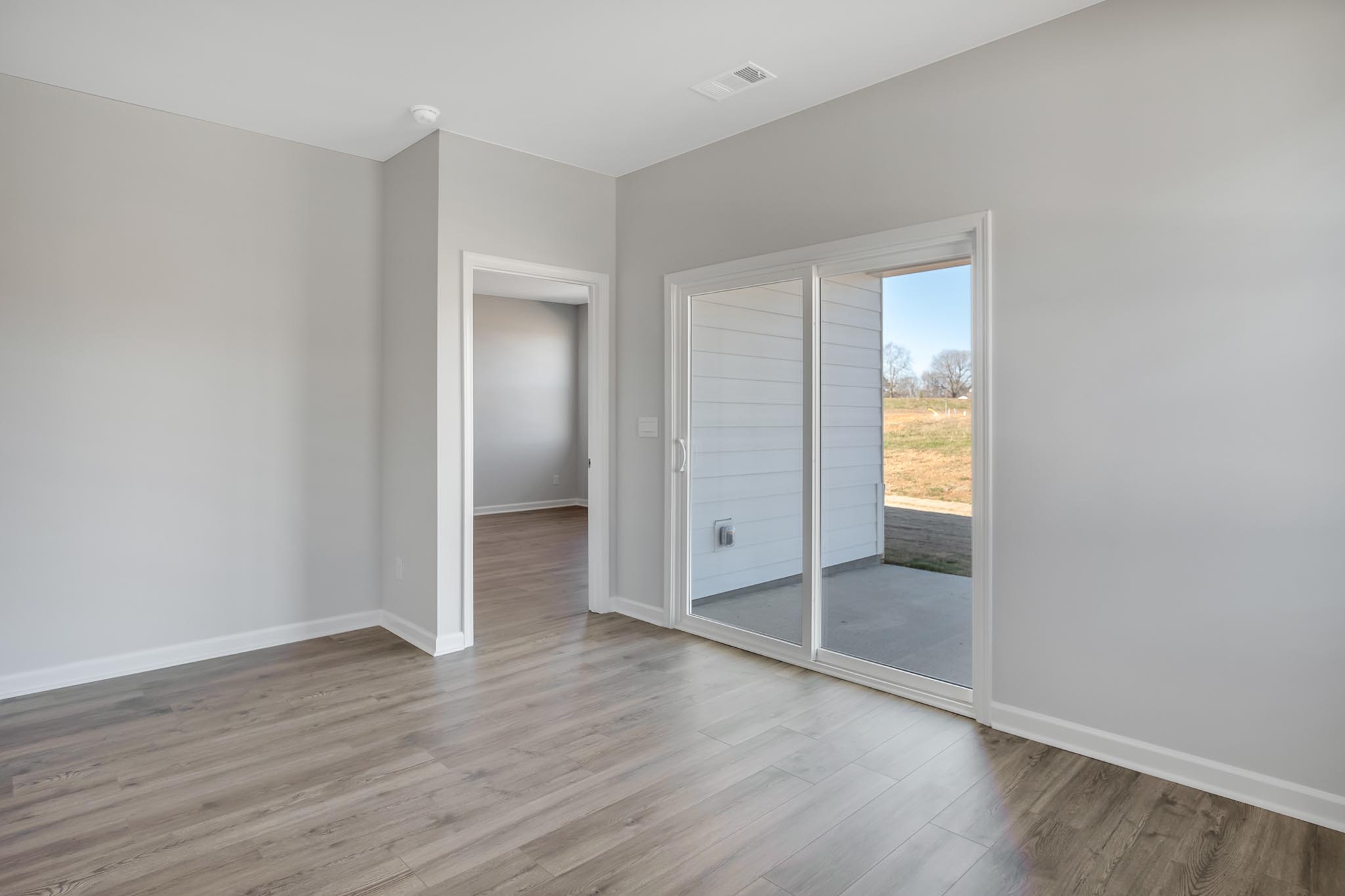 Living room with access to back door.