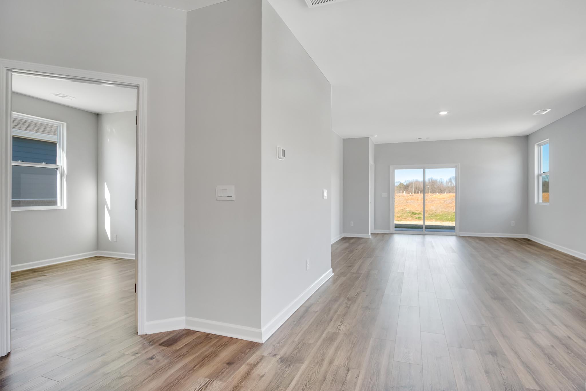 Living room with open view of back yard.