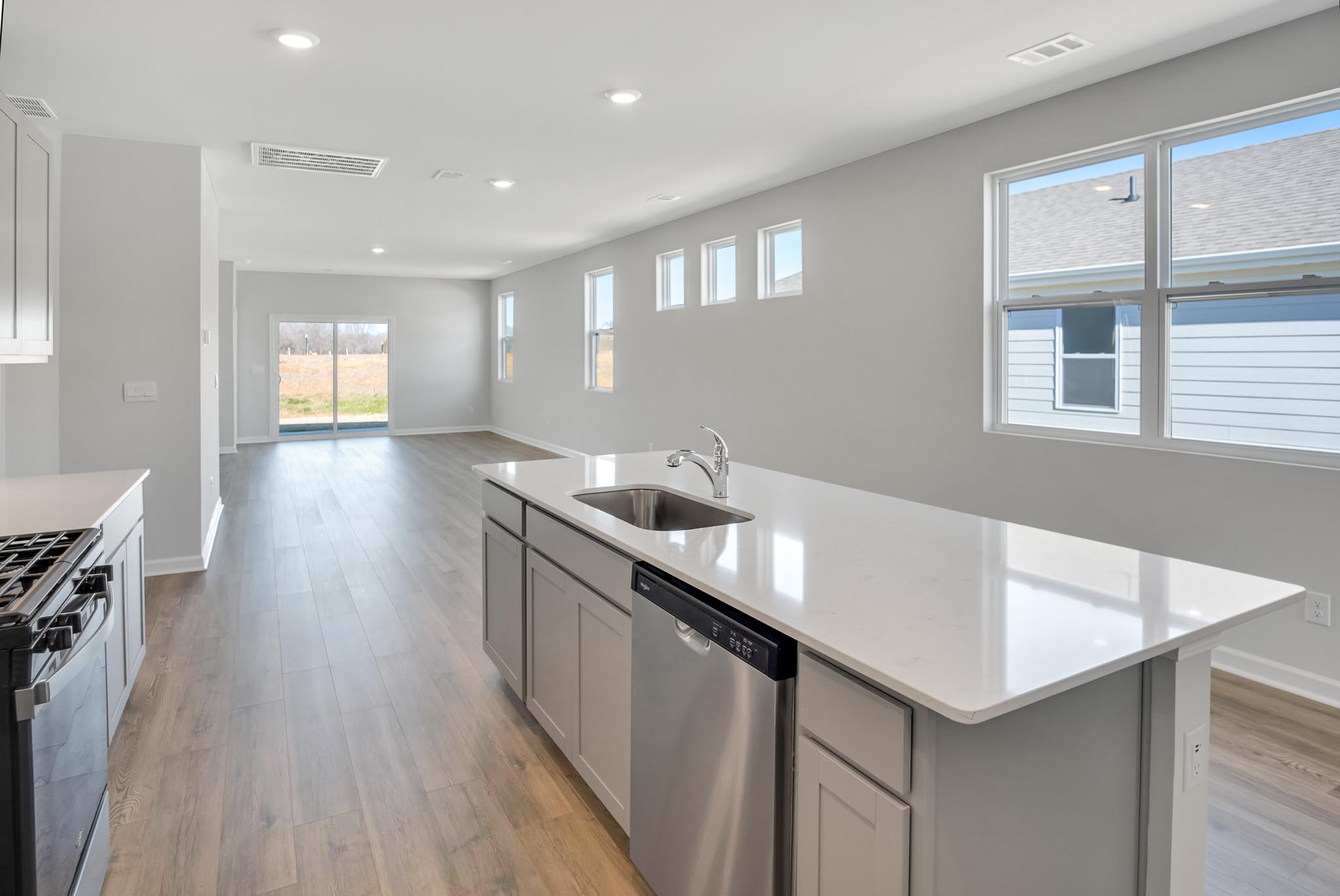 Open concept kitchen and living room.