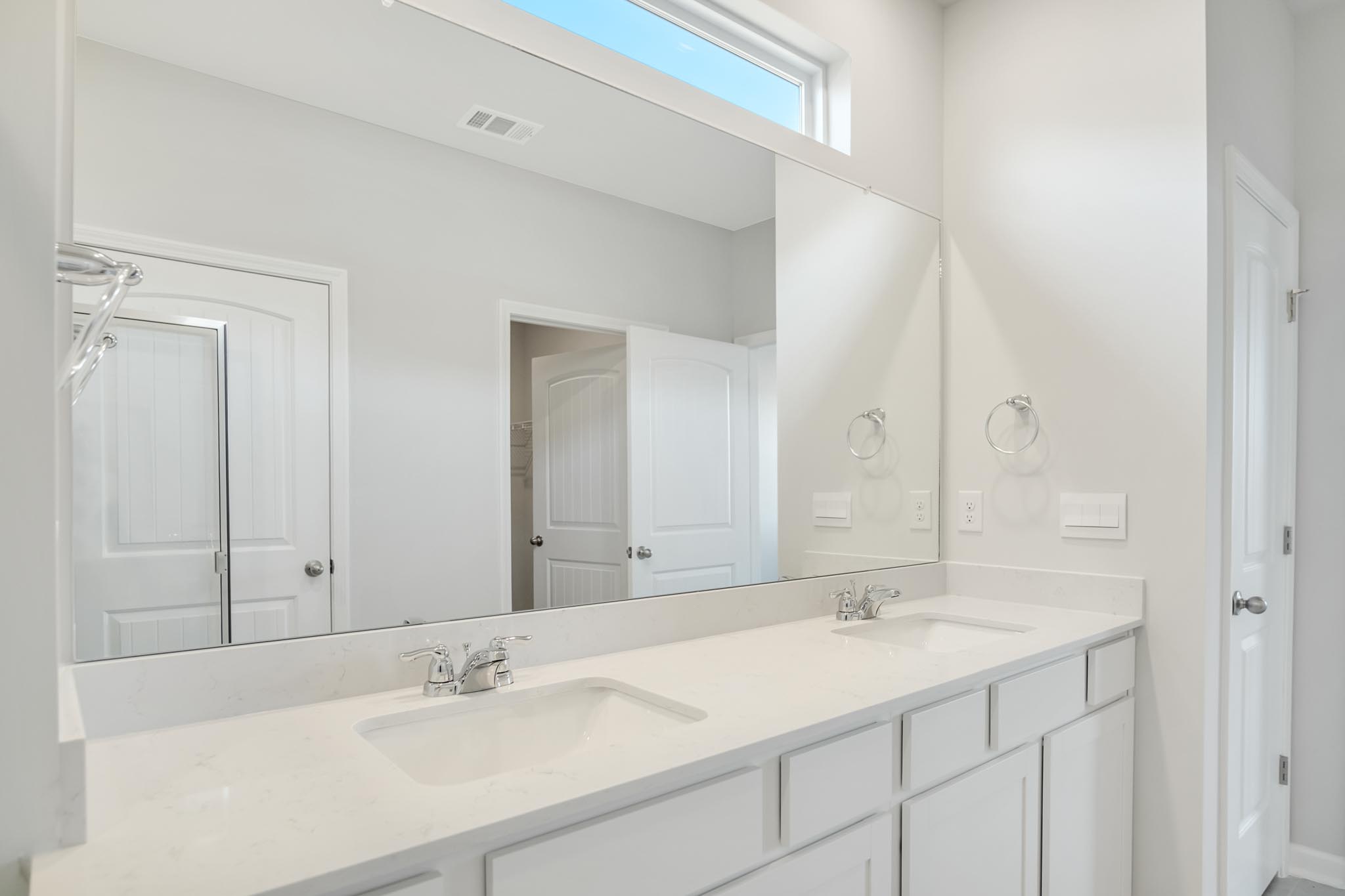 Bathroom with double sink vanity.
