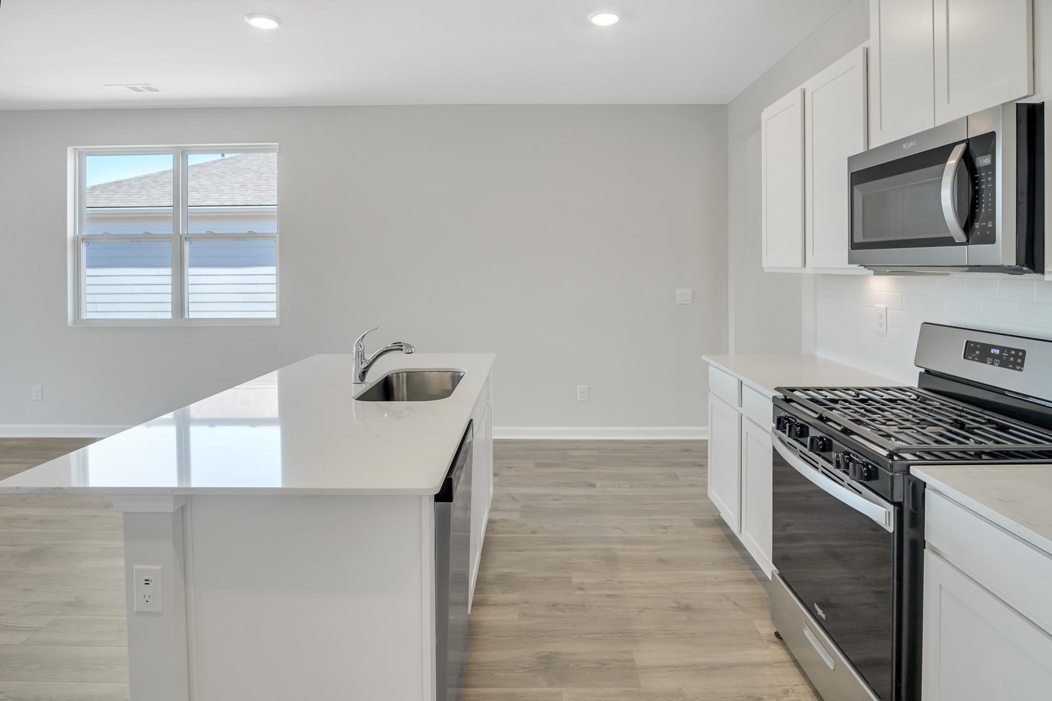Kitchen with stainless steel appliances.
