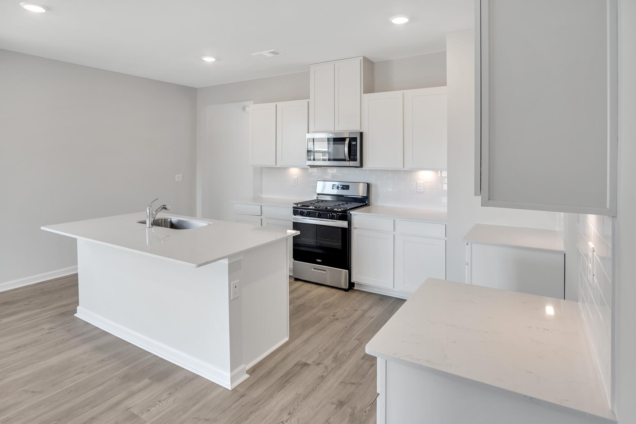 Kitchen with island and counter space.