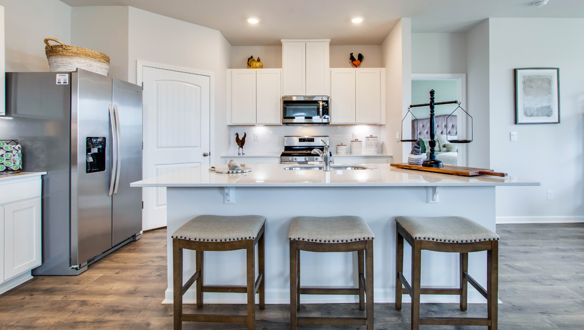 Kitchen with stainless steel appliances.