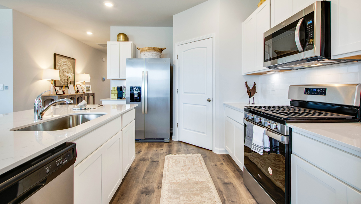 Kitchen with stainless steel appliances.