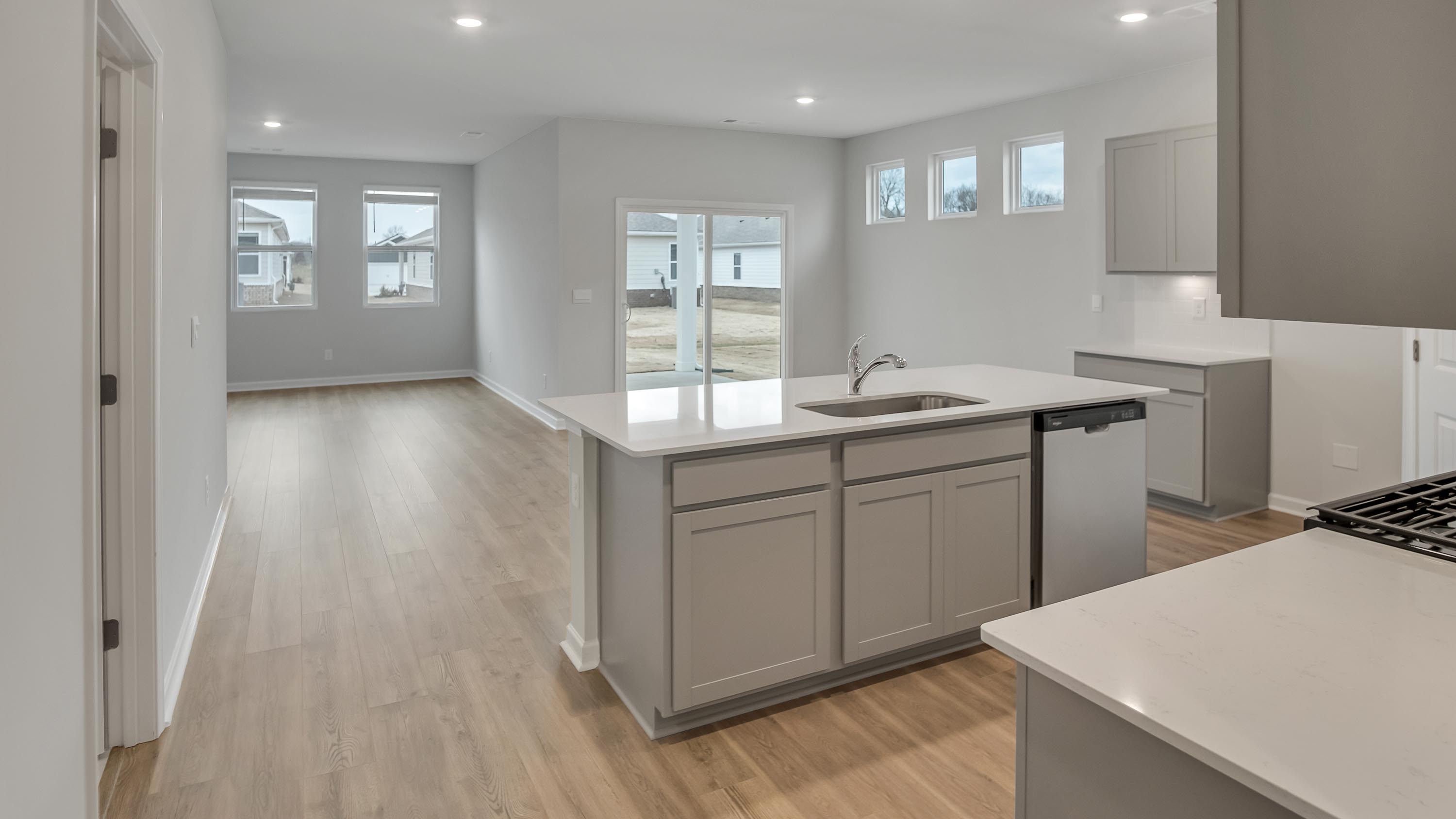 Kitchen with quartz countertops and stainless steel appliances