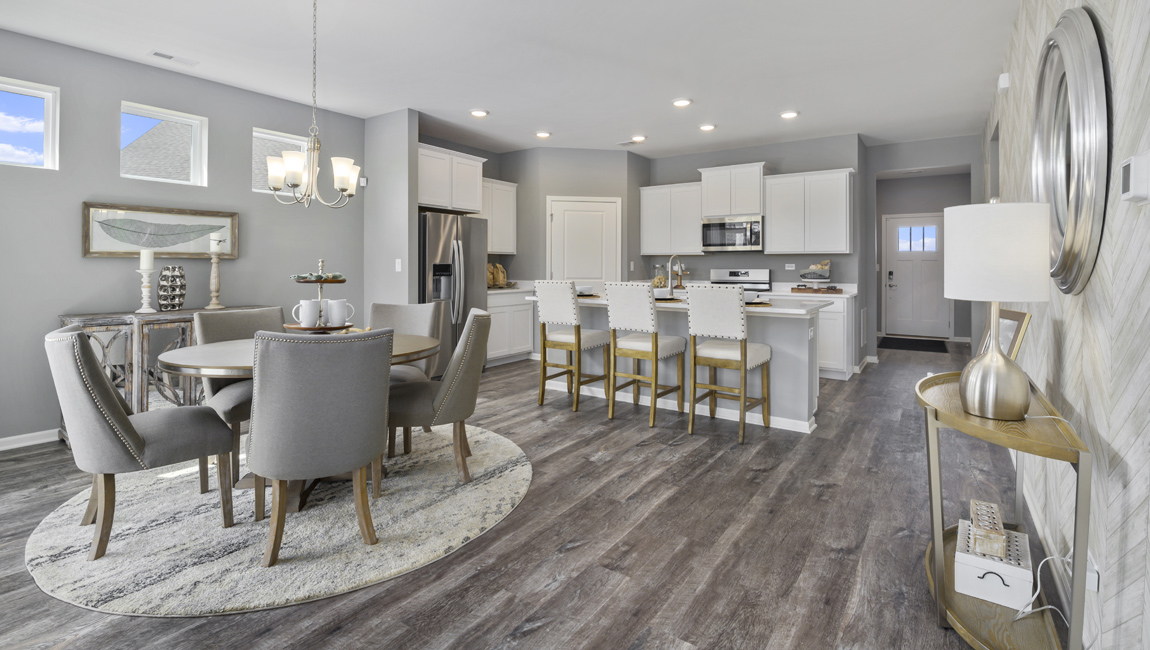 Dining area near windows for natural lighting.