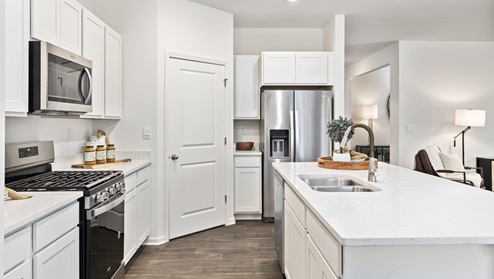 Kitchen with gas stove.