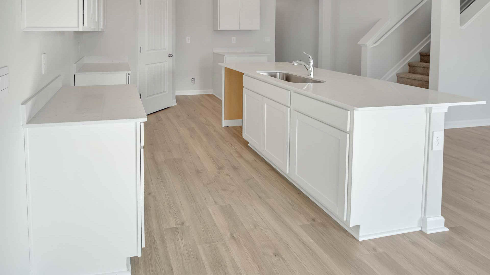 Kitchen with quartz countertops and with stainless steel appliances