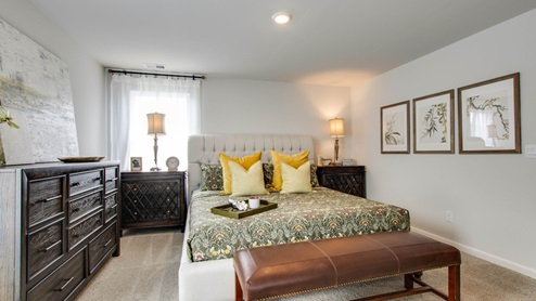 Bedroom in modern, open concept new home