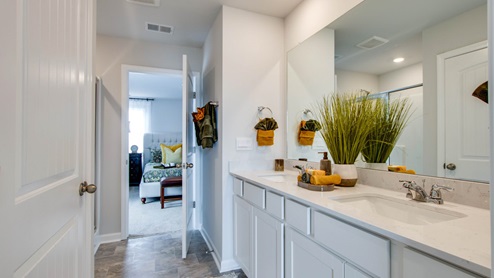 Bathroom with quartz countertops in new home
