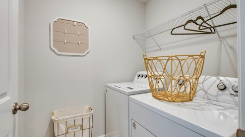 Laundry room in new two story home